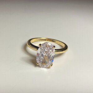 Large "3 carat" Single Stone Ring with a Gold Colour Band.